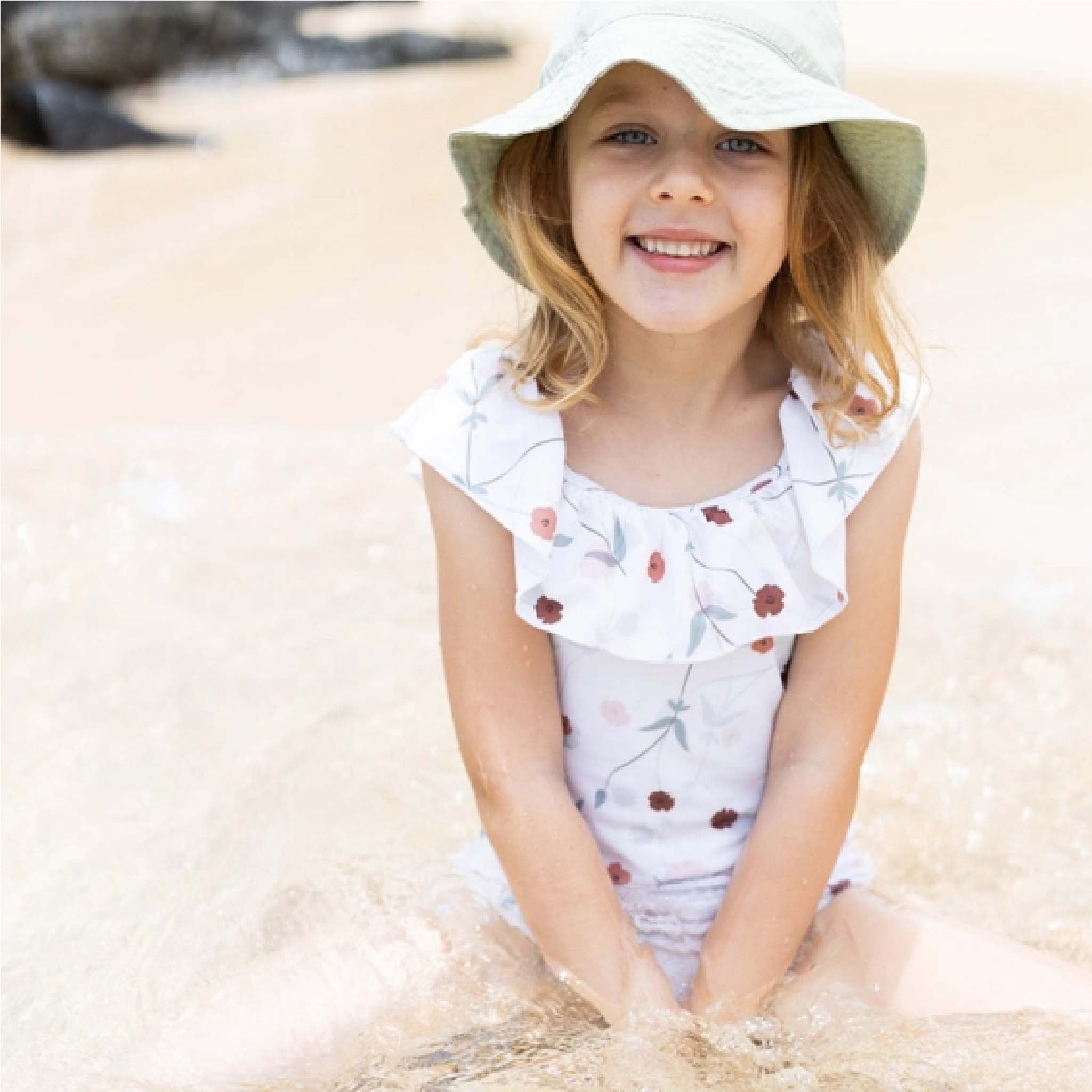 Girls Coconut Ruffle Swimsuit – UPF 50+ Eco-Friendly Swimwear