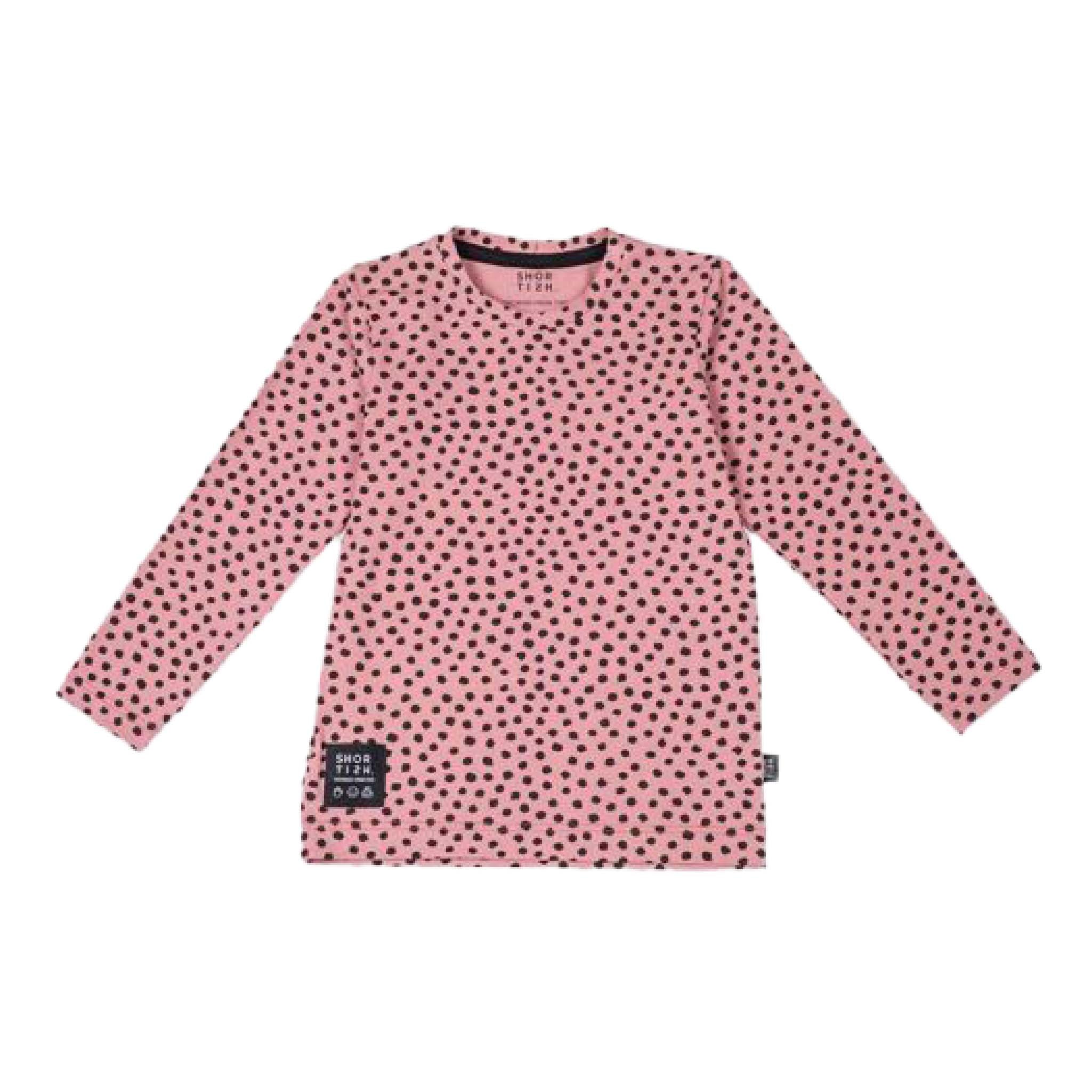 Pink long-sleeve shirt with black polka dots on a white background